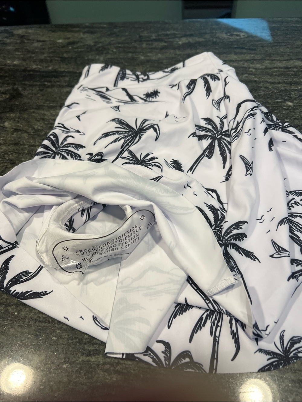 White and Grey Swim Top and Skirt with Black Palm Tree Print